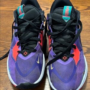 Nike Purple and Red Sneakers with Modern Design